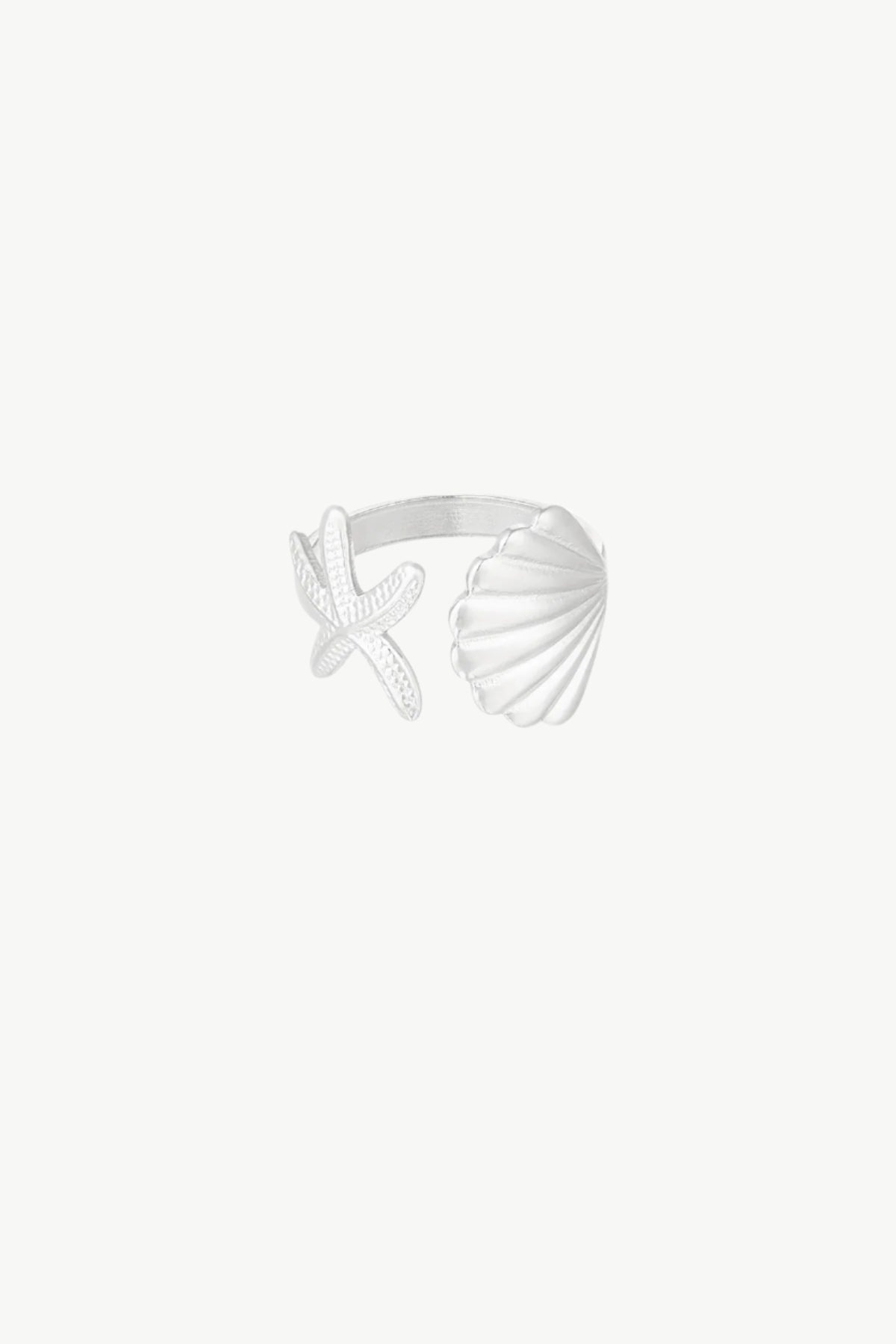 Zilveren ring met zeeschelp en ster