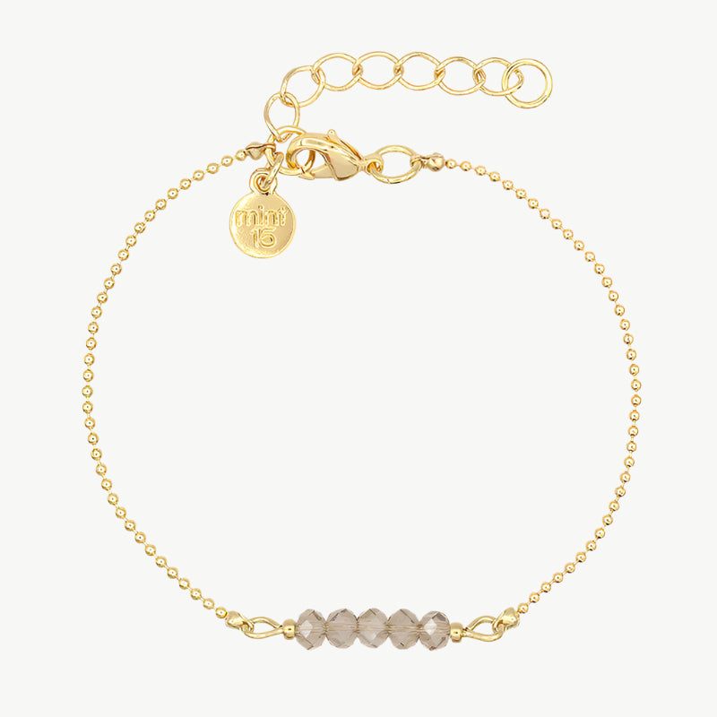 Champagne/goud kleurige facet kralenarmband