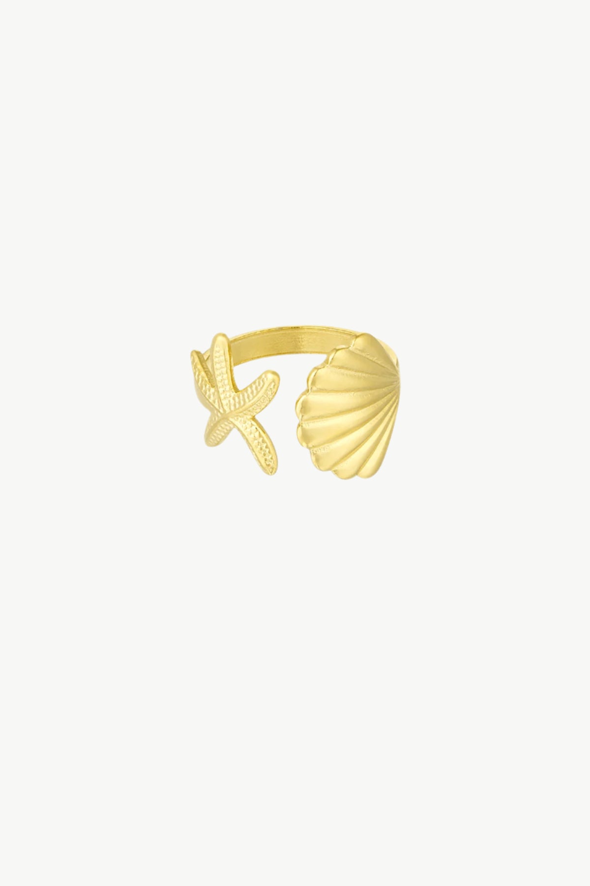 Gouden ring met zeeschelp en ster